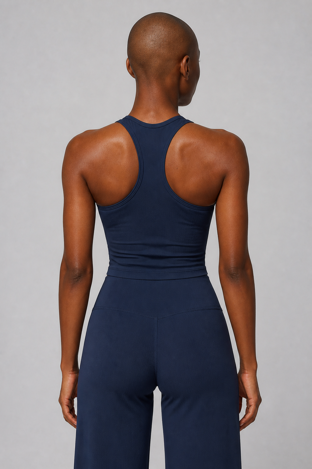 Aura Sculpt Racerback Tank in Jet Black — model view 6 | color:jet black