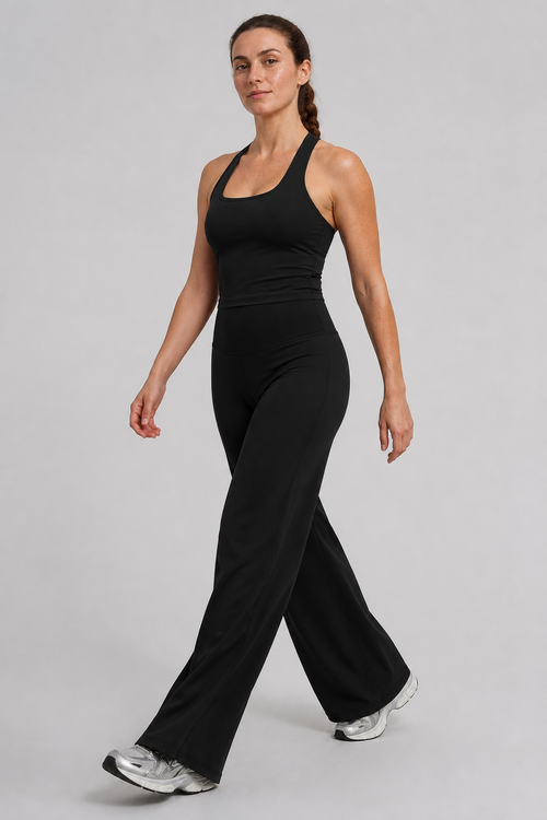 Aura Flow Wide-Leg Pants in Jet Black — model view 1 | color:jet black