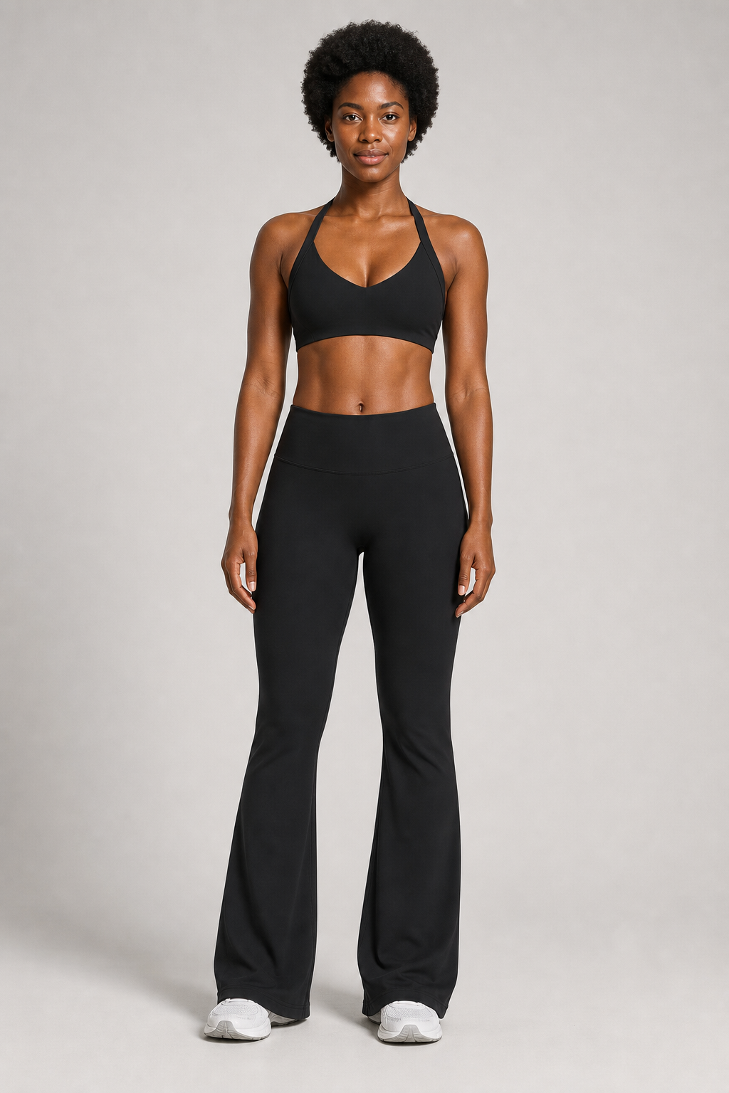 Aura Sculpt Flare Leggings in Jet Black — model view 1 | archived-session:jet black