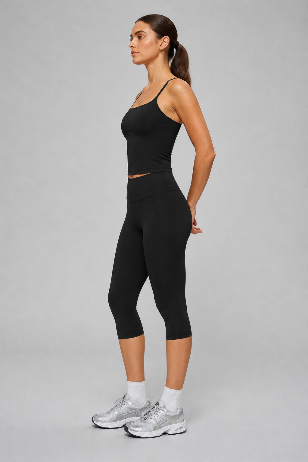 Aura Sculpt Capri Leggings in Jet Black — model view 2 | color:jet black