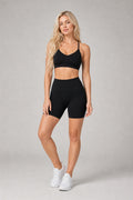 Aura™ Cross-Strap Training Bra — Jet Black — EWX3091-2 — Generated model hero
